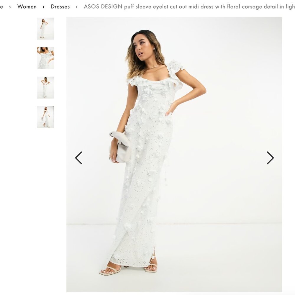 ASOS DESIGN puff sleeve eyelet cut out midi dress with floral corsage detail in